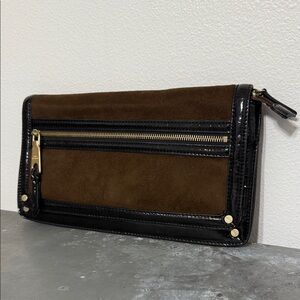 Dana Buchman Brown and Black women’s clutch purse